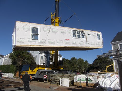 What Is A Modular Home - Crane Placing A Section of a Modular Home In Place at the Homesite.